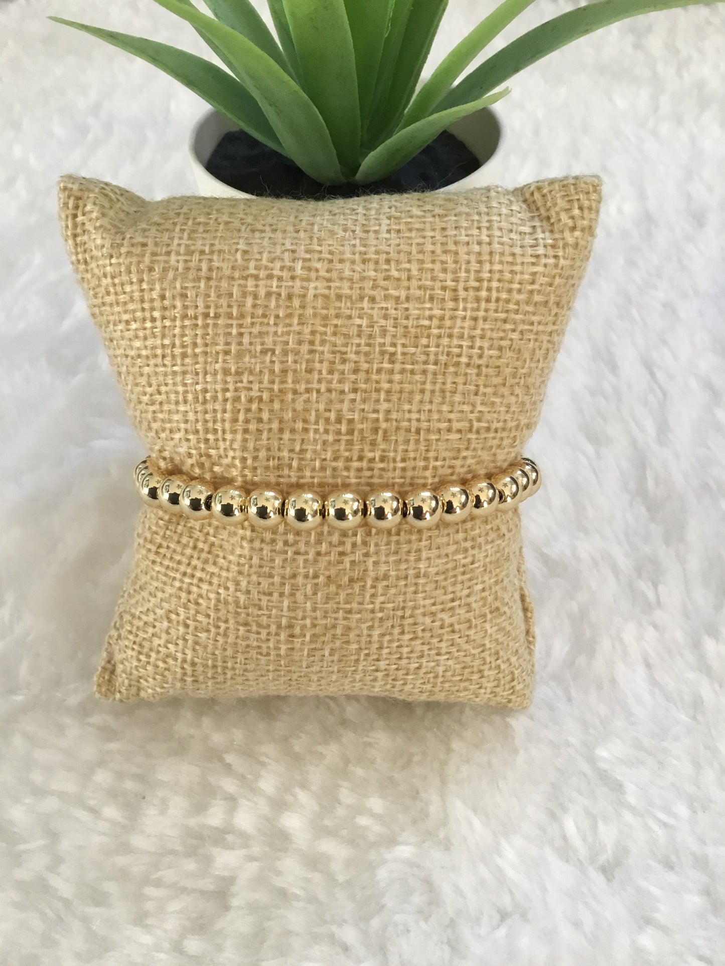 Pulsera en oro bolas pequeñas