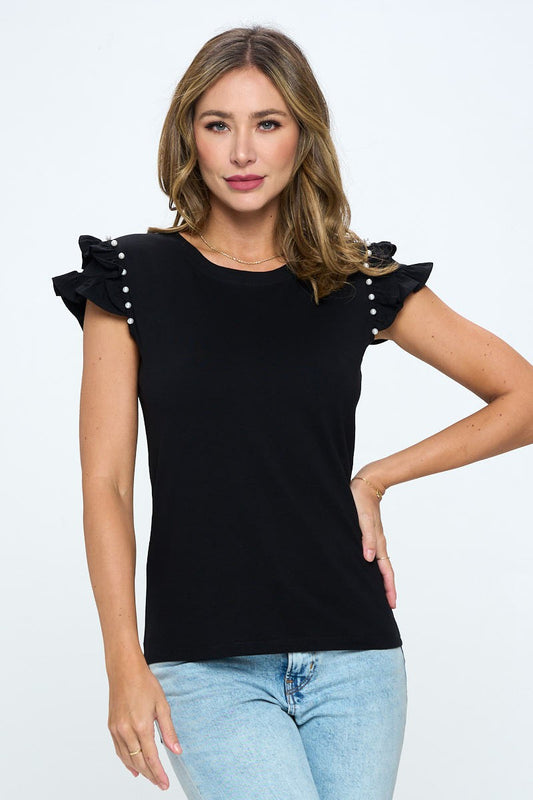 Blusa negro con perlas